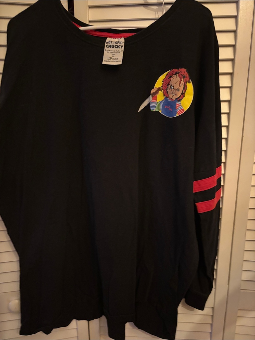 Hot Topic Black Long Sleeve Chucky Graphic Tee with Red Sleeve Stripes